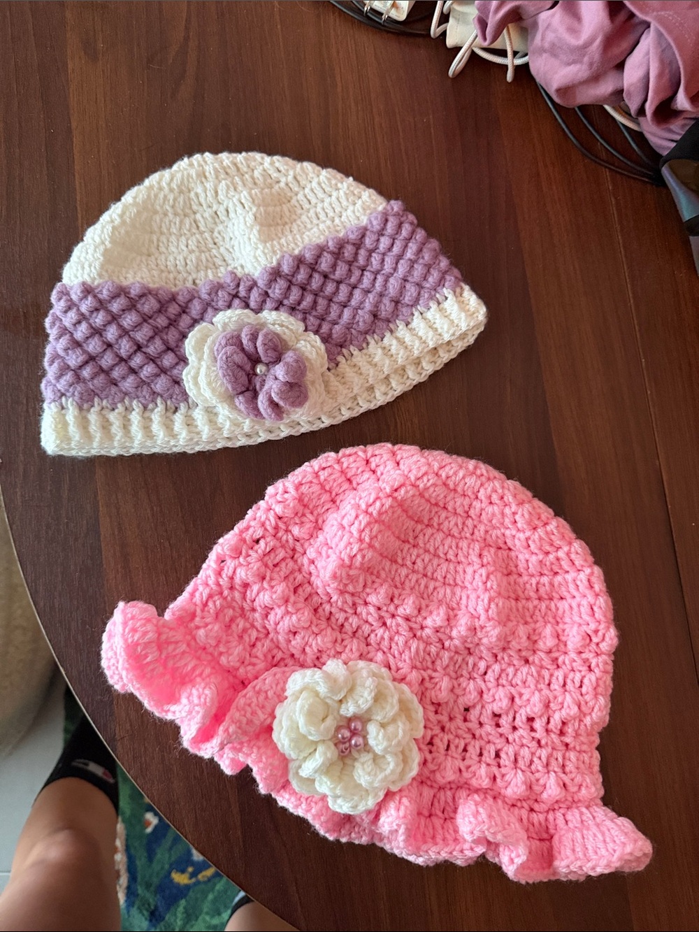 (2) Handmade Pink / purple and Cream Crochet hat with Flower Accent